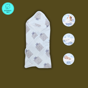 Owl printed hooded towel folded. Soft, breathable, azo-free dyes