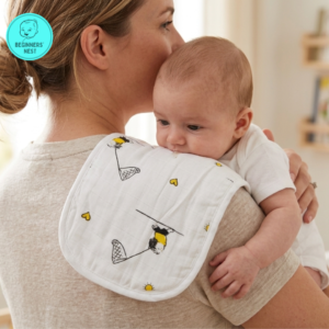 Mom holding baby over her shoulder with burp cloth